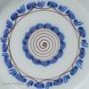 London delft pancake plate decorated in blue and manganese, circa 1740