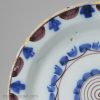 London delft pancake plate decorated in blue and manganese, circa 1740