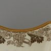 Creamware pottery dessert dish decorated with transfer print grape vine rim, circa 1810