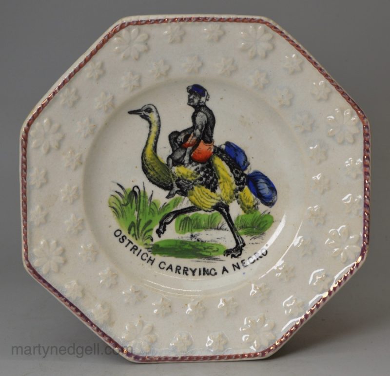 Pearlware pottery child's plate 'OSTRICH CARRYING A NEGRO', circa 1830