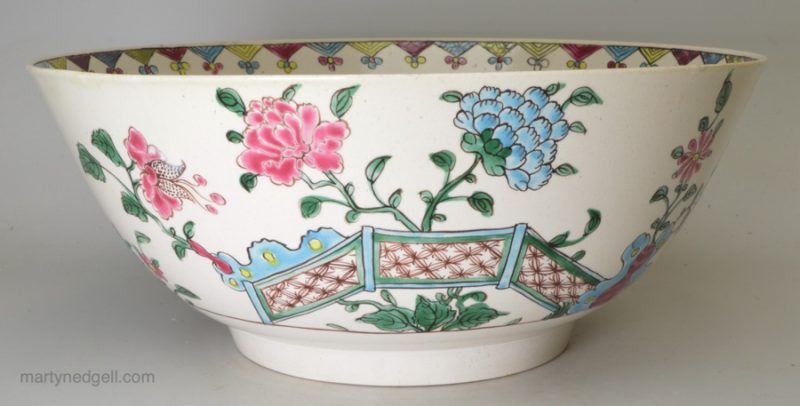 Staffordshire white saltglaze bowl decorated with famille verte enamels, circa 1760