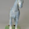 Pearlware pottery model of a horse decorated with colours under the glaze, circa 1820