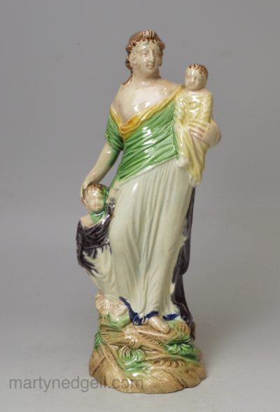 Ralph Wood figure of Charity creamware pottery decorated with colours under the glaze, circa 1795