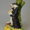 Staffordshire pearlware pottery group, 'The Tythe Pig', circa 1820