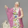 Creamware pottery figure of perhaps Lady Macbeth decorated with enamels over the glaze, circa 1820