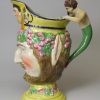Pearlware pottery jug moulded as a bacchanalian satyr and decorated with enamels over the glaze, circa 1820