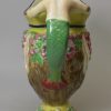 Pearlware pottery jug moulded as a bacchanalian satyr and decorated with enamels over the glaze, circa 1820