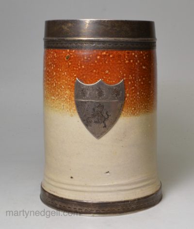 Fulham saltglaze stoneware mug with a glass bottom and silver crest, circa 1720