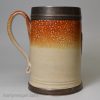Fulham saltglaze stoneware mug with a glass bottom and silver crest, circa 1720