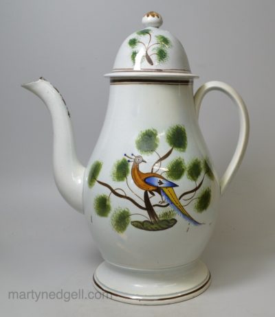 Pearlware pottery coffee pot decorated with pea fowl in colours under the glaze, circa 1820