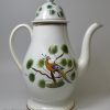 Pearlware pottery coffee pot decorated with pea fowl in colours under the glaze, circa 1820