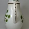 Pearlware pottery coffee pot decorated with pea fowl in colours under the glaze, circa 1820