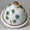 Pearlware pottery coffee pot decorated with pea fowl in colours under the glaze, circa 1820