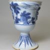 London delft small flower vase moulded with strange heads, circa 1720