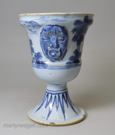 London delft small flower vase moulded with strange heads, circa 1720