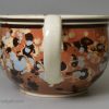 Slip decorated creamware pottery mug, circa 1800