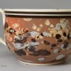 Slip decorated creamware pottery mug, circa 1800