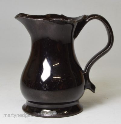 Small Jackfield black pottery creamer, circa 1770