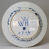 Liverpool delft marriage plate painted with the crucifixion and dated 1749