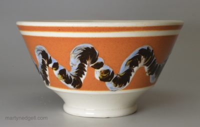 Mochaware bowl decorated with a snail trail in slip, circa 1830