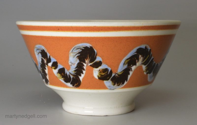 Mochaware bowl decorated with a snail trail in slip, circa 1830