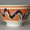 Mochaware bowl decorated with a snail trail in slip, circa 1830