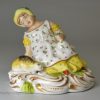 Pair of derby porcelain figures of girls with their pets, circa 1820