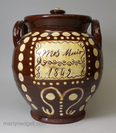 Mrs. Muir's redware slip decorated storage jar and cover dated 1849, Scottish