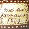 Mrs. Muir's redware slip decorated storage jar and cover dated 1849, Scottish