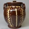 Mrs. Muir's redware slip decorated storage jar and cover dated 1849, Scottish