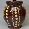 Mrs. Muir's redware slip decorated storage jar and cover dated 1849, Scottish
