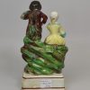 Staffordshire pearlware pottery figure of the musicians, circa 1820