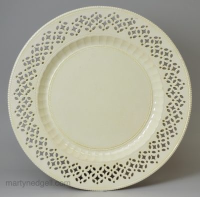 English creamware pottery plate with a pierced border, circa 1780