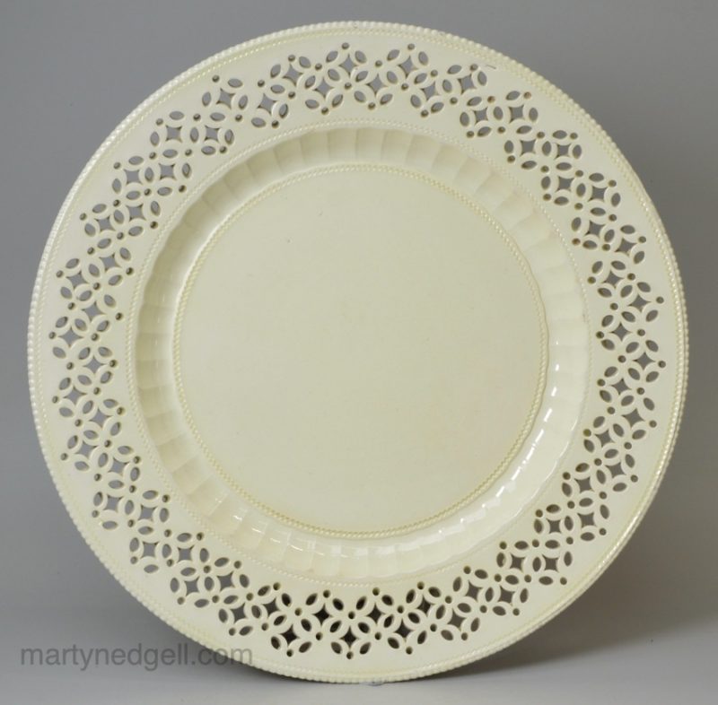 English creamware pottery plate with a pierced border, circa 1780