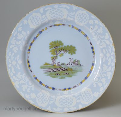Bristol delft polychrome plate with a bianco bianco border, circa 1750