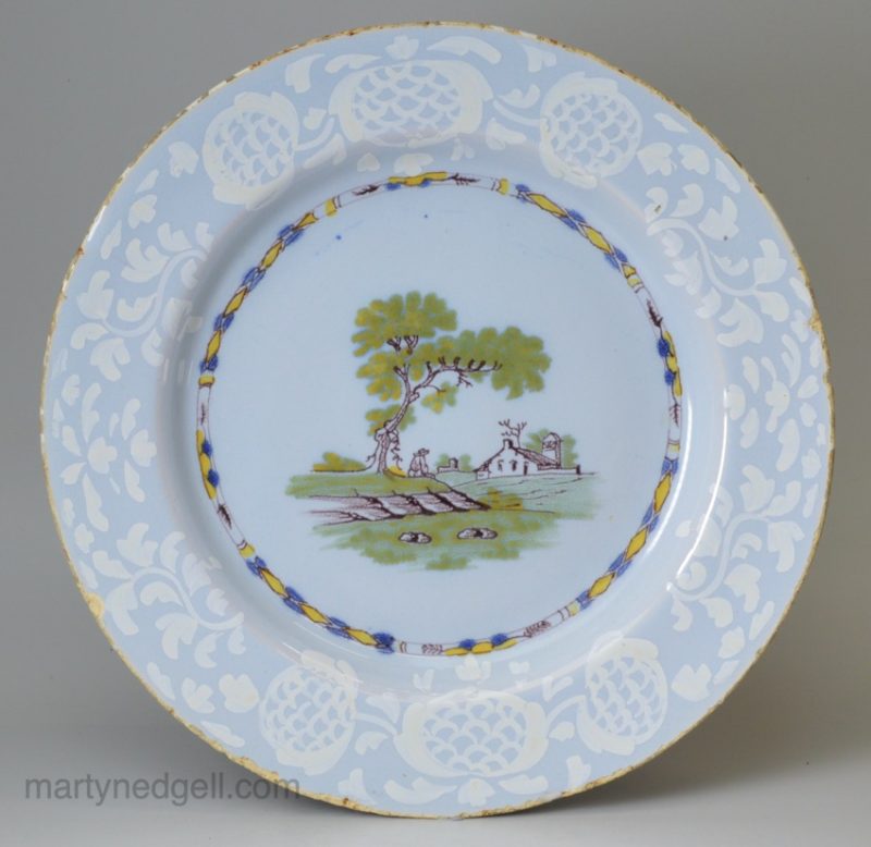 Bristol delft polychrome plate with a bianco bianco border, circa 1750