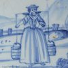 London delft tile painted with a milkmaid, circa 1750