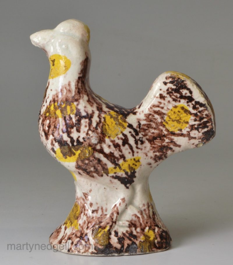 Pearlware pottery model of a chicken decorated with colours under the glaze, circa 1800