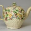 Creamware pottery teapot moulded with flowers and decorated with colours under the glaze, circa 1770 William Greatbatch Pottery Staffordshire