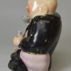 Staffordshire pearlware pottery figure of a Hotei after Chinese original, circa 1820