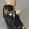 Staffordshire pearlware pottery figure of a Hotei after Chinese original, circa 1820