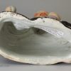 Staffordshire pearlware pottery figure of a Hotei after Chinese original, circa 1820