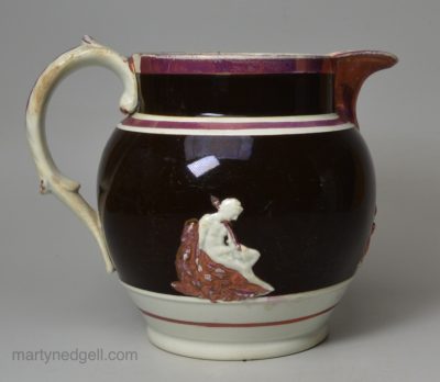 Pearlware pottery jug with pink lustre and brown slip decoration, circa 1820