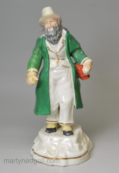 Staffordshire porcelain model of a Jewish pedlar or money changer, circa 1820