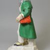 Staffordshire porcelain model of a Jewish pedlar or money changer, circa 1820