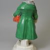 Staffordshire porcelain model of a Jewish pedlar or money changer, circa 1820