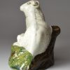 Pearlware pottery sheep and lamb decorated with colours under the glaze, circa 1800