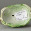 Pearlware pottery figure of a squirrel decorated with colours under the glaze, circa 1800