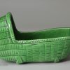 Green glazed pottery toy cradle, circa 1820