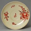 Creamware coffee cup and saucer decorated with enamels over the glaze, circa 1780